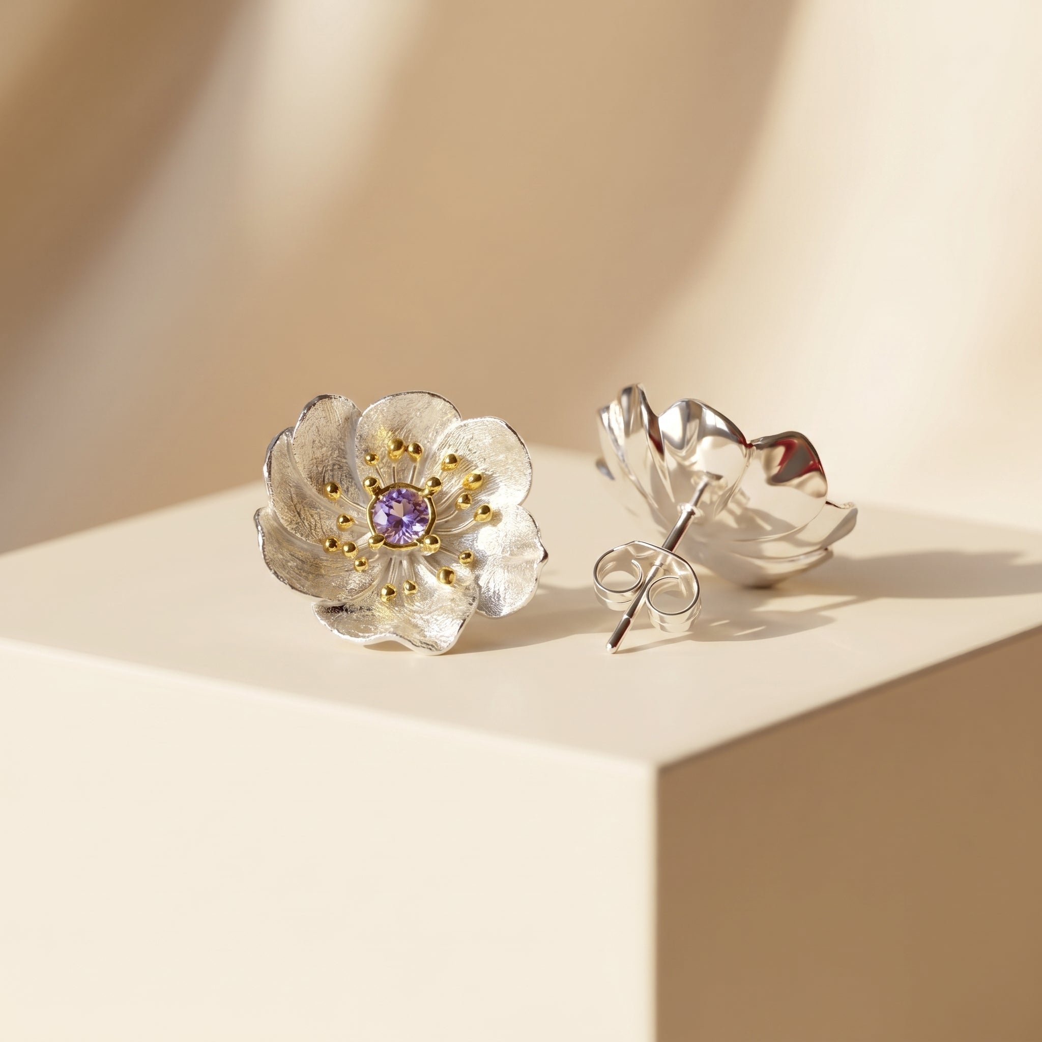 925 sterling silver flower earrings showing front floral design and secure stud backing