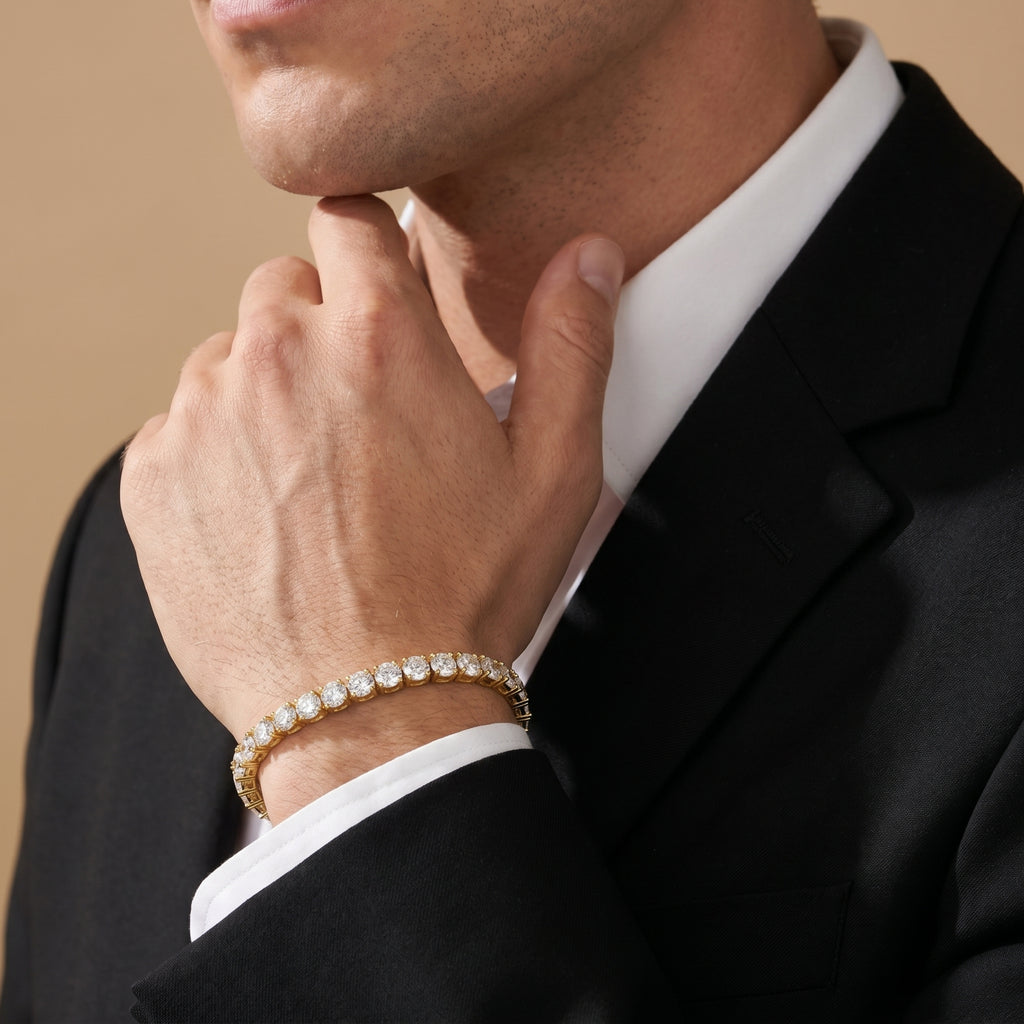 Luxury men's gold tennis bracelet styled with black suit and white shirt
